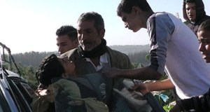 Samir ‘Awad being evacuated from the scene after being shot, 15 January 2013. Photo: Nasar Mghar